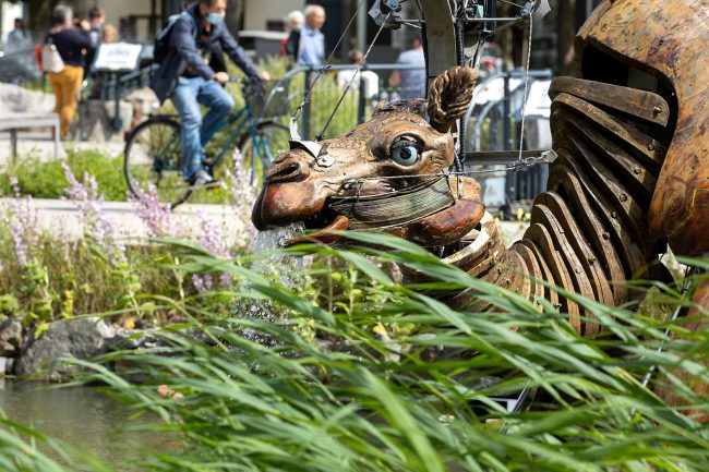 A technician mounted on the back of the mechanical hippopotamus of the Place Napoléon Animals in La Roche-sur-Yon
